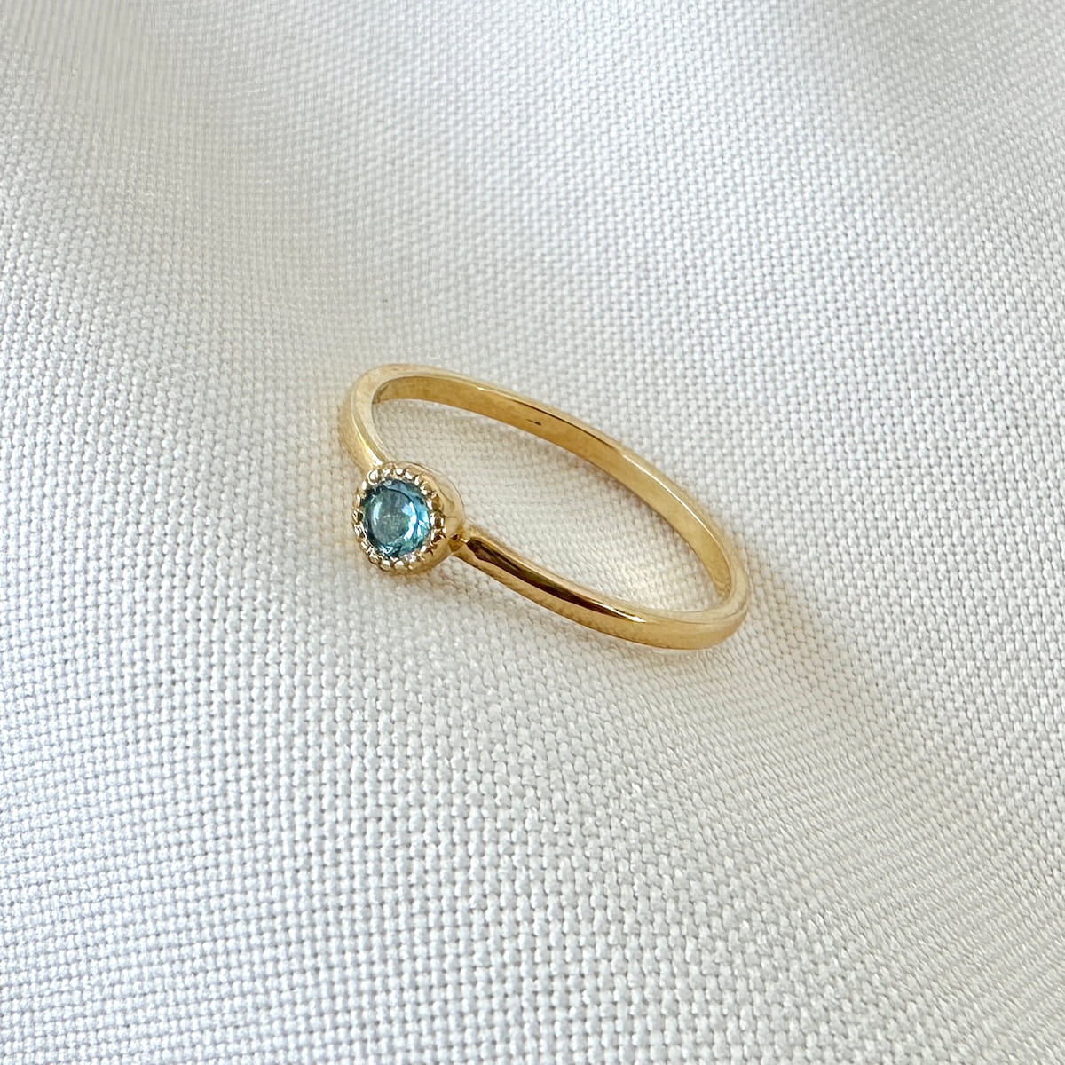 anillo clásico topacio