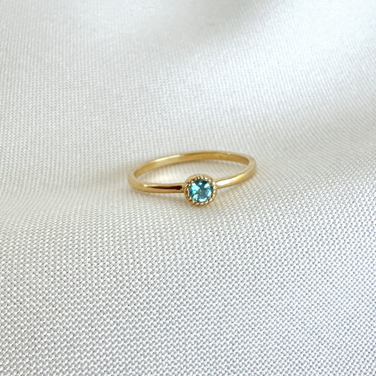 anillo clásico topacio